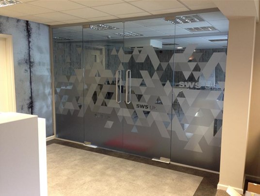 Meeting room custom designed printed frosted vinyl graphics fitted to an internal glass wall.