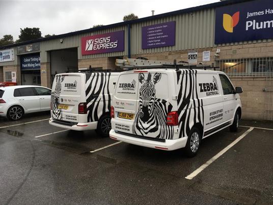 Zebra electrical fleet vehicle graphics