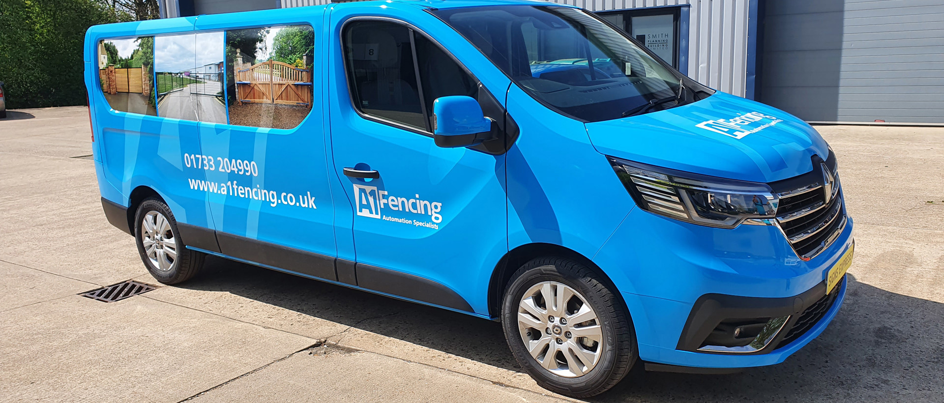 Full wrap for A1 fencing with blue vinyl and prints