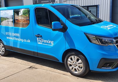 Full wrap for A1 fencing with blue vinyl and prints