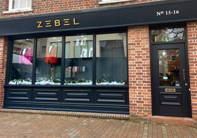 Exterior Shop Fascia With Fret Cut Gold Acrylic Letters On Stand Off Locators