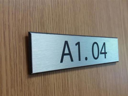Internal brushed aluminium door signs