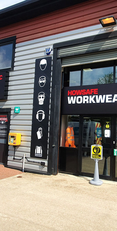 Illuminated tray signs for Howsafe Workwear & PPE shop