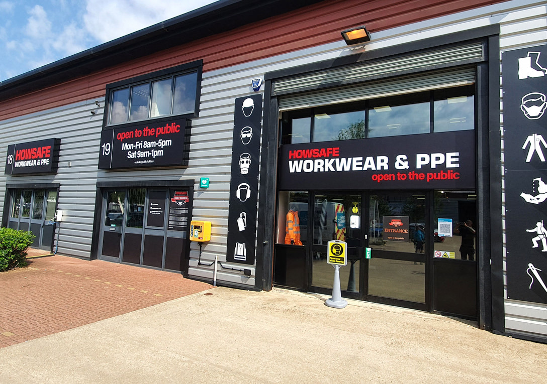 Illuminated tray signs for Howsafe Workwear & PPE shop