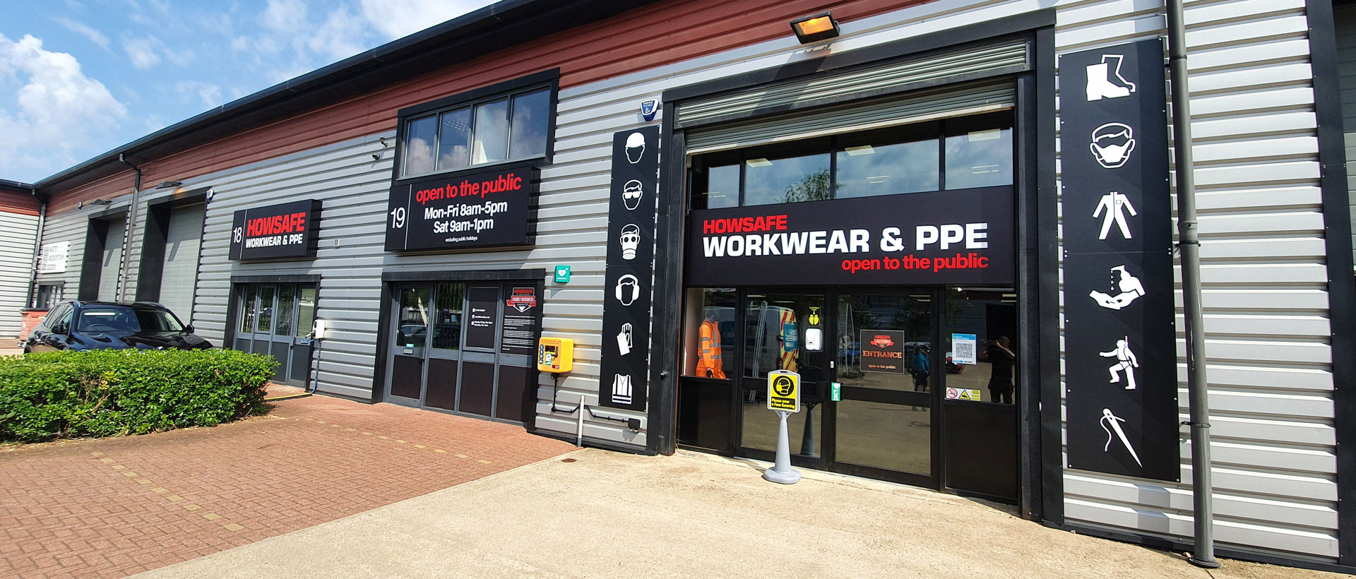 Illuminated tray signs for Howsafe Workwear & PPE shop