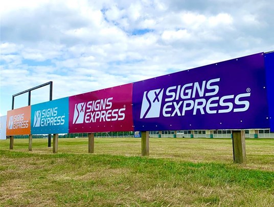 Logo Boards On Racetrack In Bath